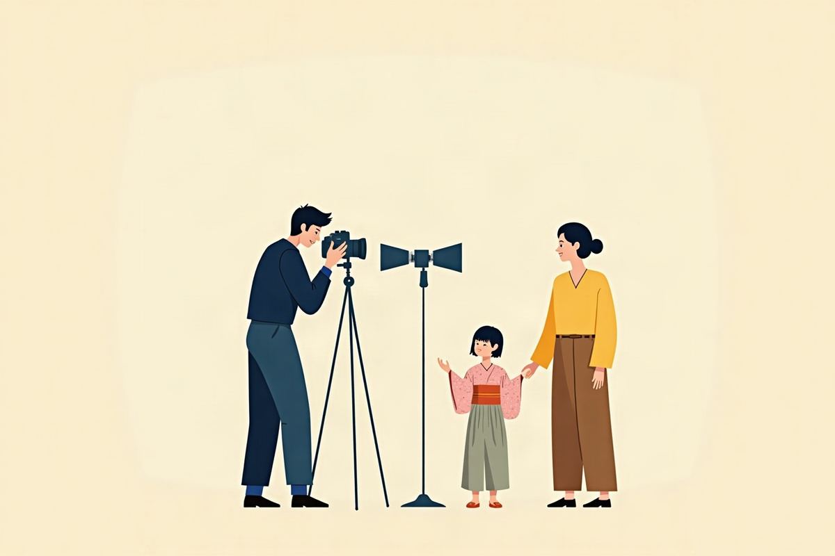 写真館のスタジオで、着物の子どもを撮影するカメラマンのイラスト